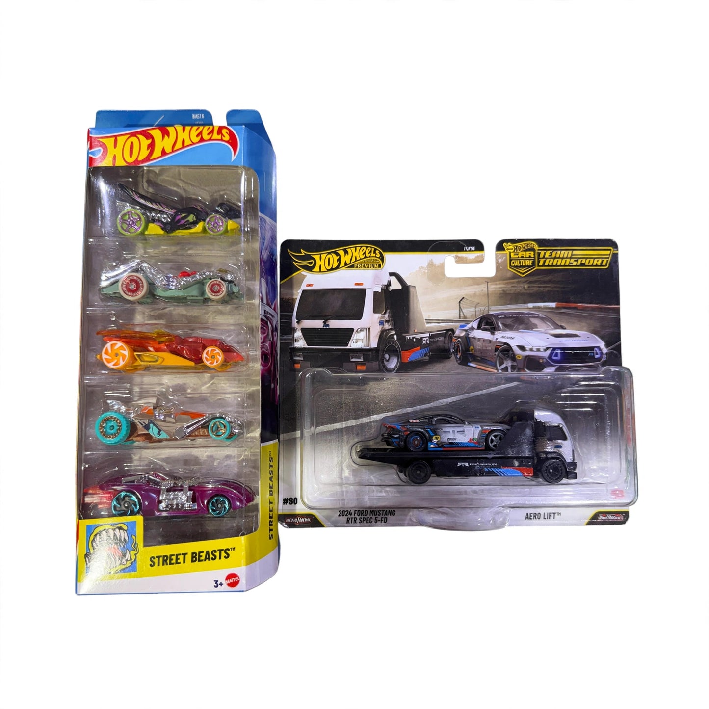 HotWheels team transport + HotWheels 5 pack random fantasies